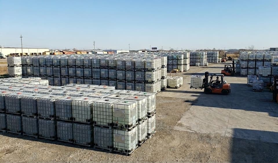 IBC Tanks Recycling facility yard with hundreds of intermediate bulk containers